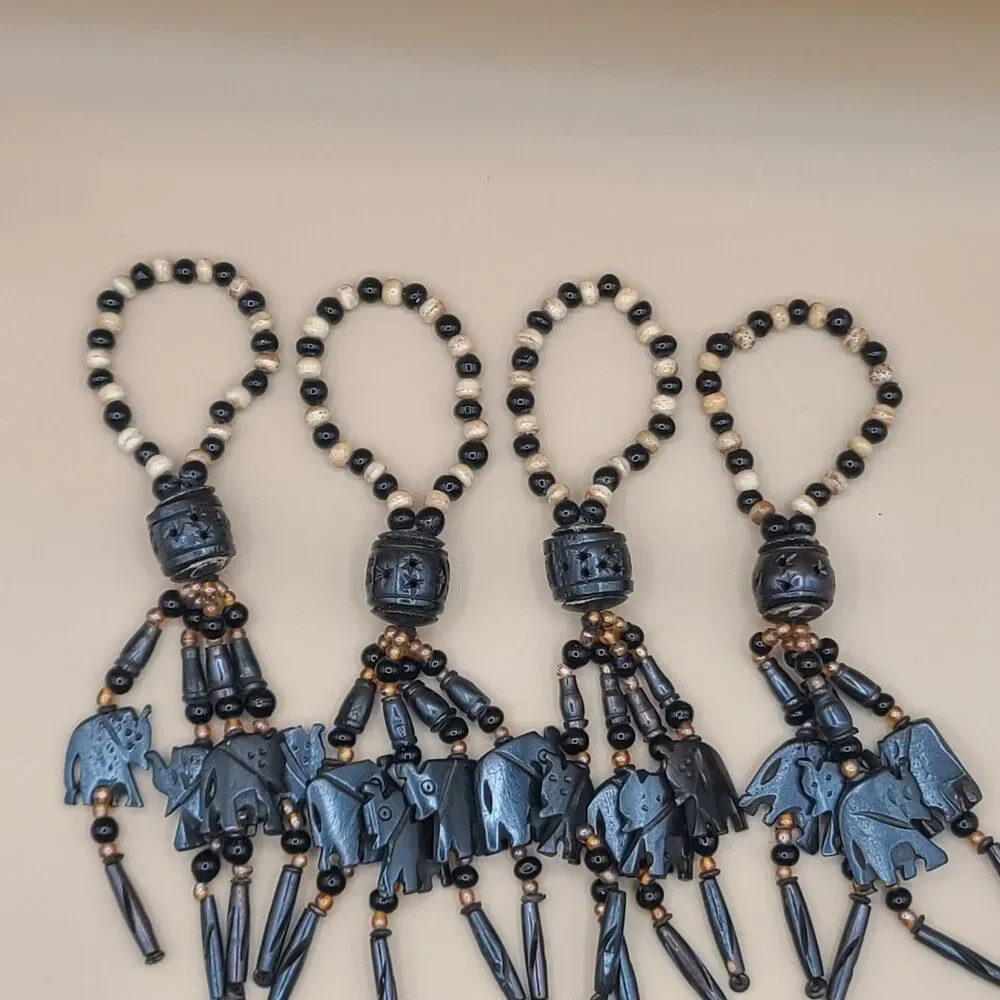 Vtg Pier 1 Imports Hand Carved Wood Beaded Elephant Napkin Rings Set of 7